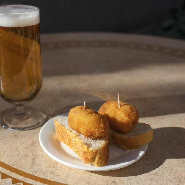 Spanish pincho (tapa) with beer