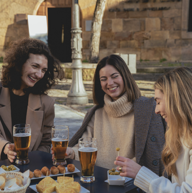 Girlfriends sharing Spanish tapas